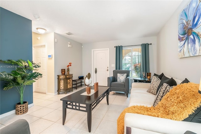 living room with light tile patterned floors