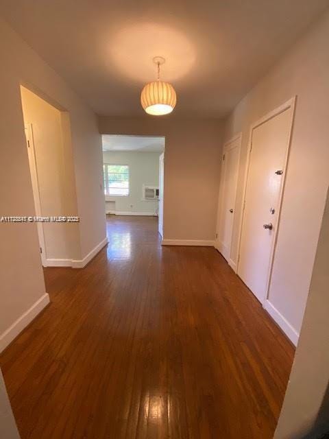 hall featuring dark hardwood / wood-style floors