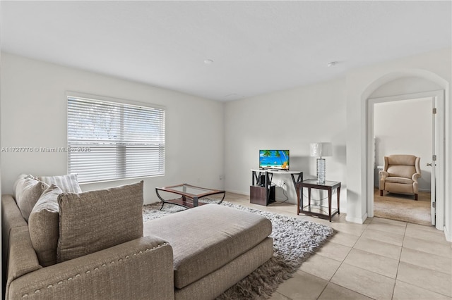 living room with light tile patterned flooring