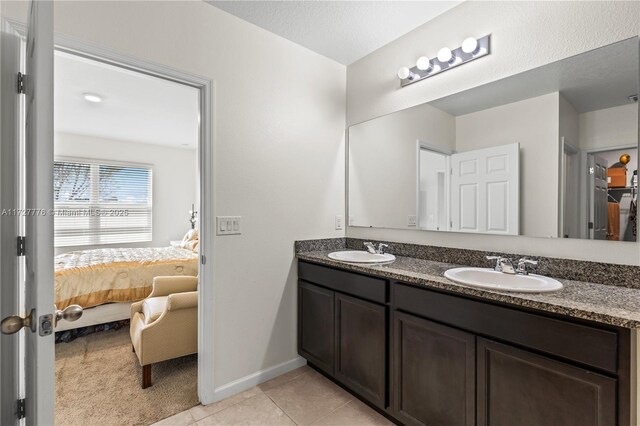 bathroom featuring vanity and tile patterned floors