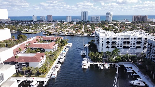 birds eye view of property featuring a water view