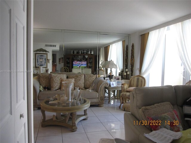 living room with light tile patterned floors