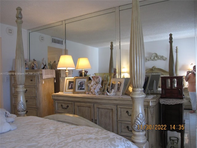 bedroom with a textured ceiling