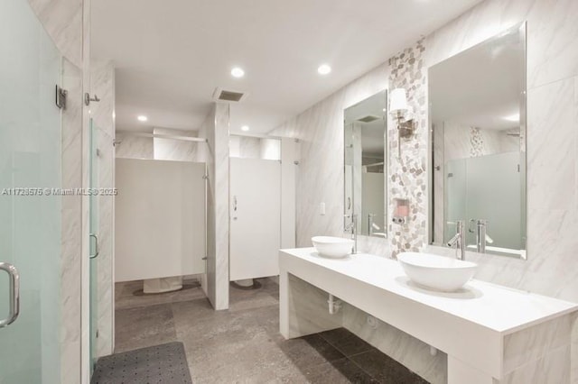 bathroom with vanity and an enclosed shower