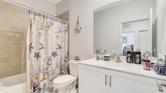 full bathroom with toilet, vanity, and shower / bath combo with shower curtain