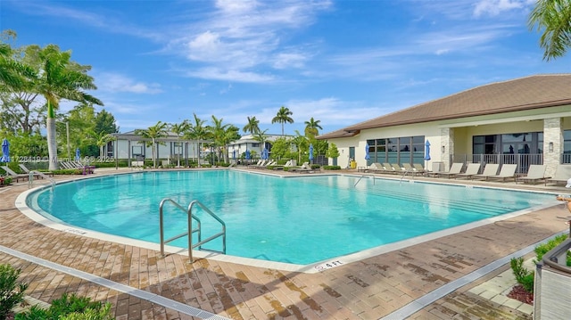 view of swimming pool featuring a patio