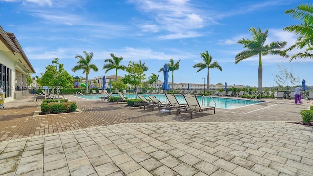 view of pool featuring a patio