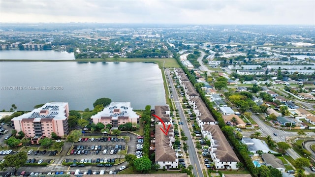 drone / aerial view with a water view