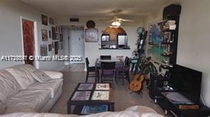 living room featuring ceiling fan