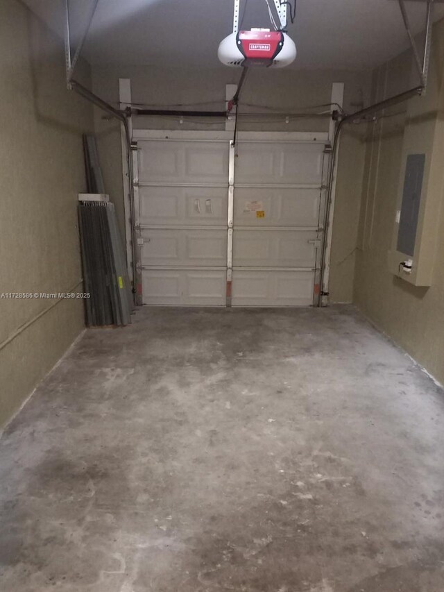 laundry room featuring light tile patterned floors and washing machine and dryer