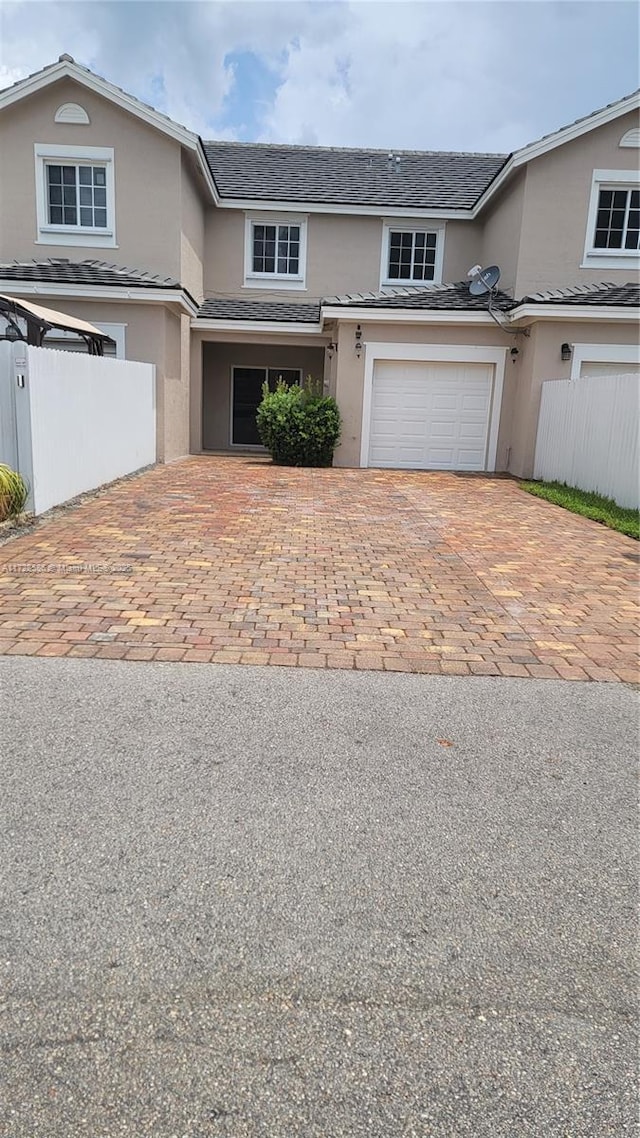 front facade with a garage