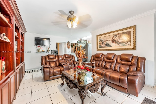 living room featuring ceiling fan, light tile patterned floors, and crown molding