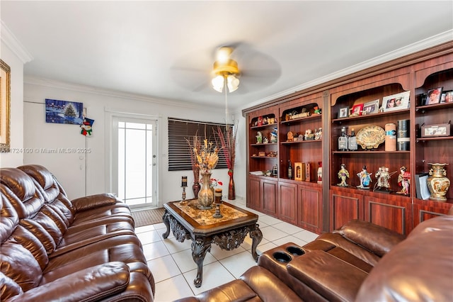 living room with ceiling fan, light tile patterned flooring, and crown molding