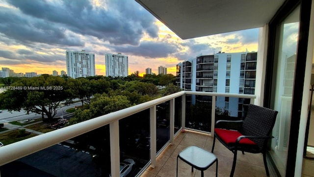 view of balcony at dusk