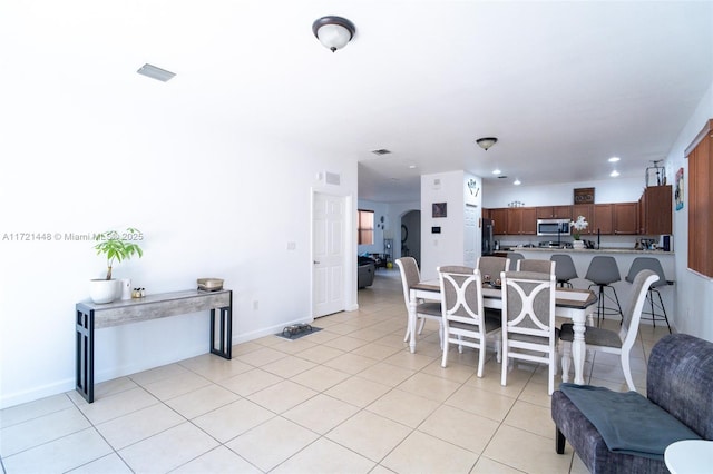 view of tiled dining space