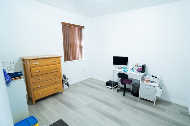 office space featuring light wood-type flooring