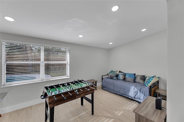 recreation room featuring hardwood / wood-style flooring