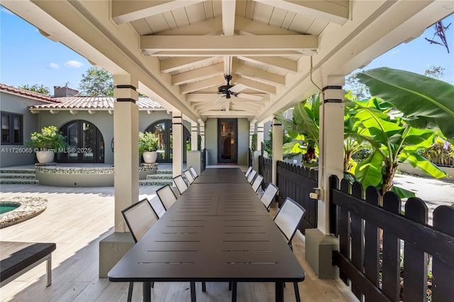 view of patio / terrace featuring ceiling fan