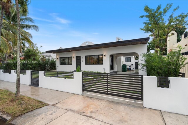 modern home with a front yard