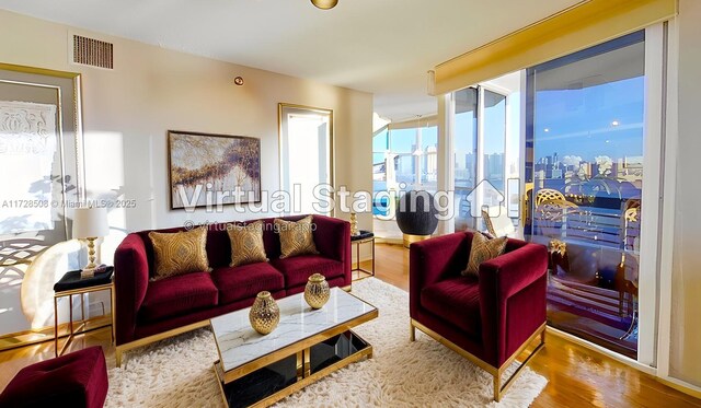 3600 Mystic Pointe Unit 1801, Aventura, FL 33180 - living room featuring wood finished floors