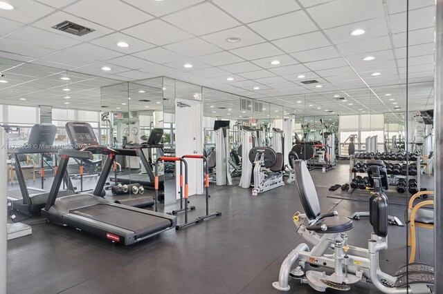3600 Mystic Pointe Unit 1801, Aventura, FL 33180 - gym featuring healthy amount of natural light and a paneled ceiling