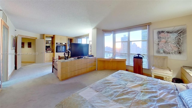3600 Mystic Pointe Unit 1801, Aventura, FL 33180 - bedroom featuring light colored carpet and a textured ceiling