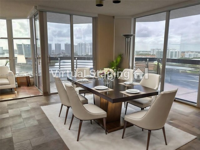3600 Mystic Pointe Unit 1801, Aventura, FL 33180 - dining space featuring a view of city, expansive windows, and plenty of natural light