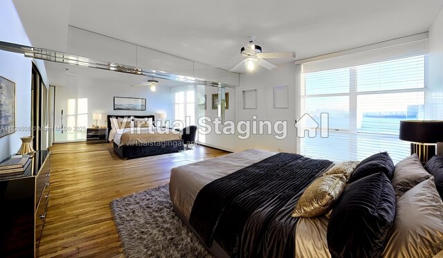 3600 Mystic Pointe Unit 1801, Aventura, FL 33180 - bedroom featuring wood finished floors and ceiling fan