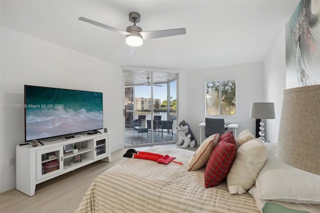 bedroom featuring ceiling fan, access to exterior, and wood-type flooring