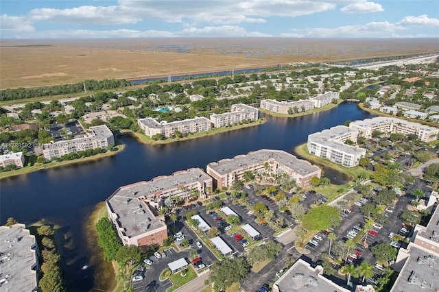 drone / aerial view featuring a water view