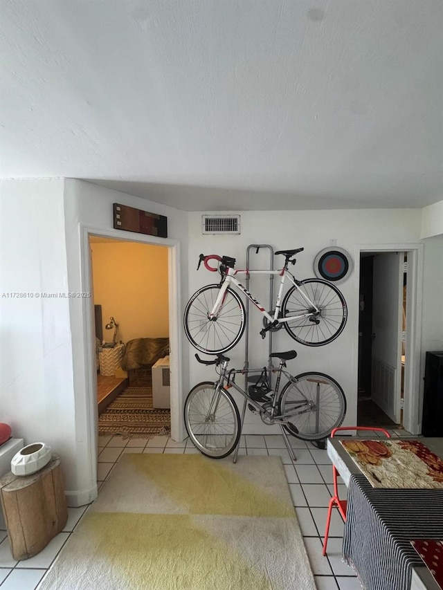 interior space featuring light tile patterned flooring