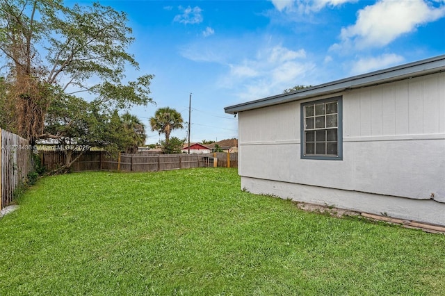 view of yard featuring a fenced backyard