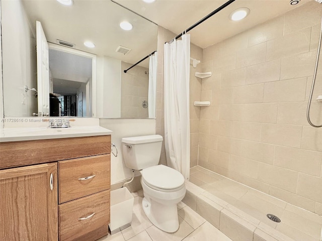 bathroom with toilet, vanity, tile patterned flooring, and a shower with shower curtain