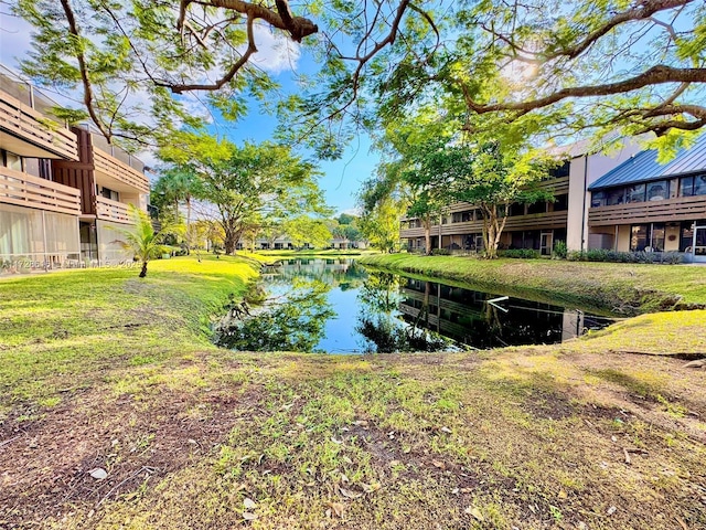 view of yard with a water view