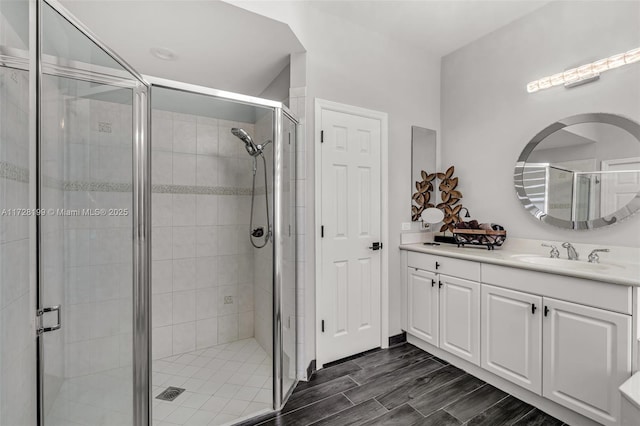 bathroom with vanity and walk in shower