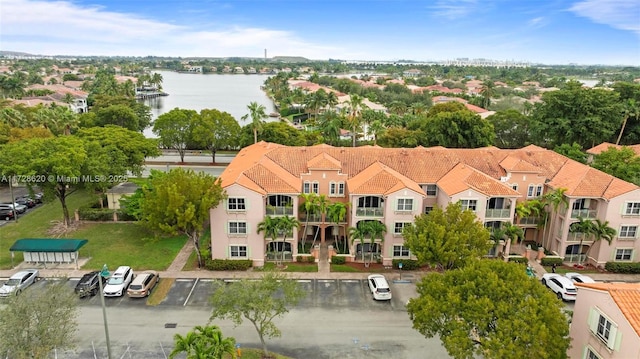 drone / aerial view with a water view