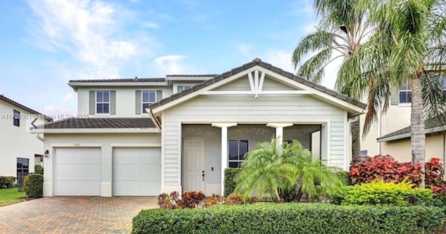 view of front of property featuring a garage