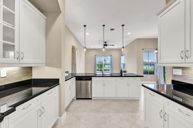 kitchen featuring dishwasher, white cabinetry, sink, hanging light fixtures, and ceiling fan