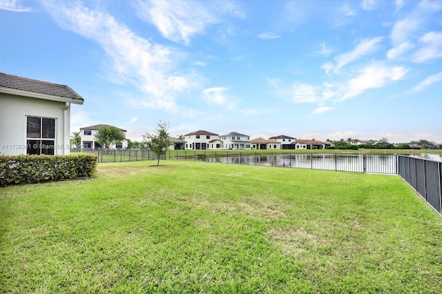 view of yard with a water view