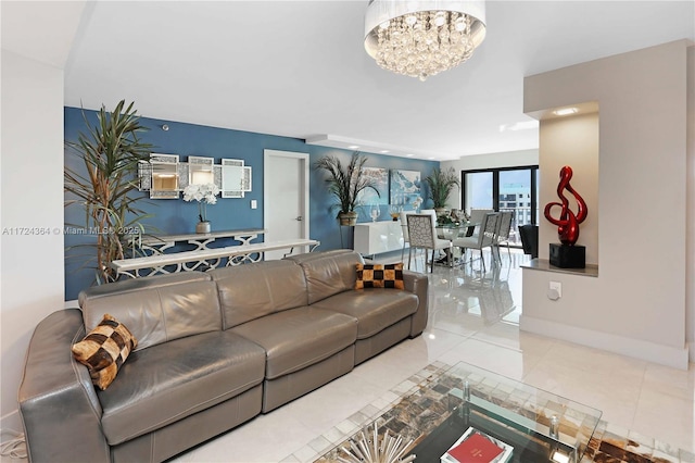 living room with tile patterned floors and a chandelier