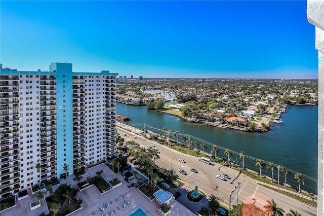 bird's eye view featuring a water view and a city view