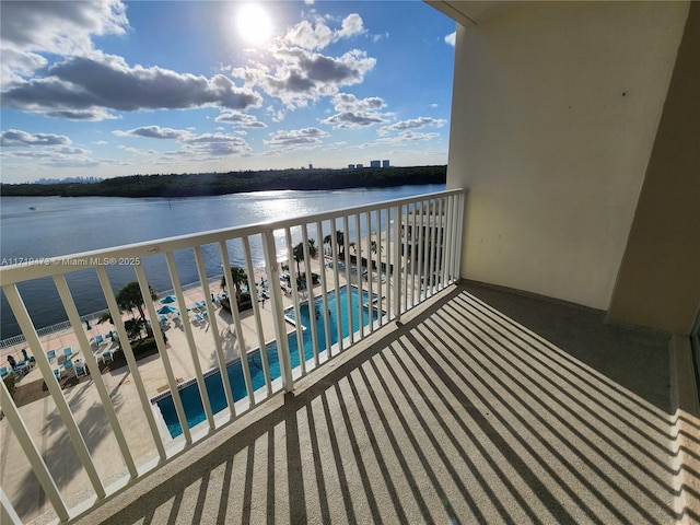 balcony featuring a water view