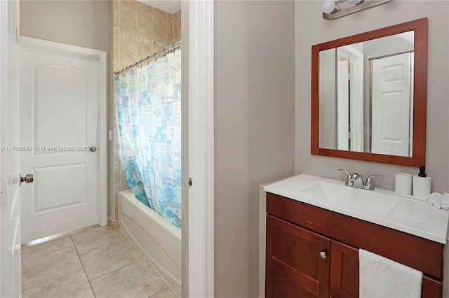 bathroom featuring shower / bath combination with curtain, vanity, and tile patterned floors