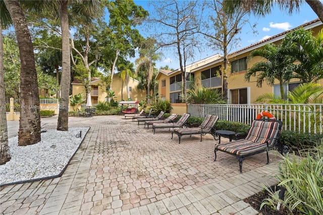 view of home's community with a patio