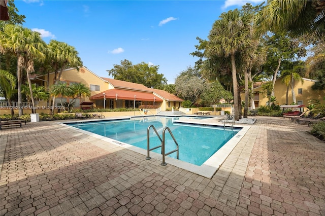 view of pool featuring a patio area