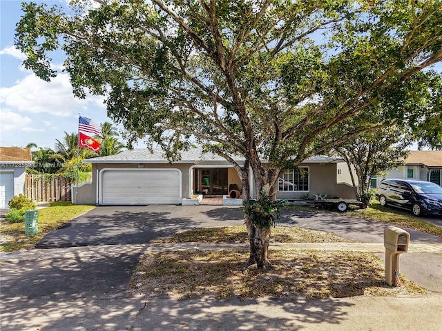 single story home with a garage