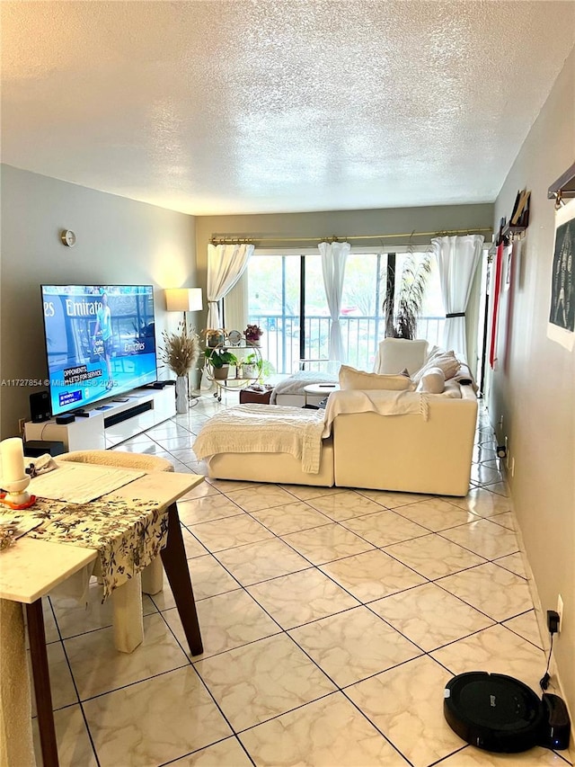 tiled living room with a textured ceiling