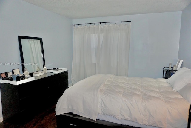 bedroom with a textured ceiling