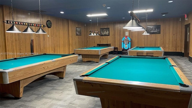 rec room featuring light carpet, billiards, and wooden walls