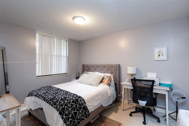 bedroom with a textured ceiling